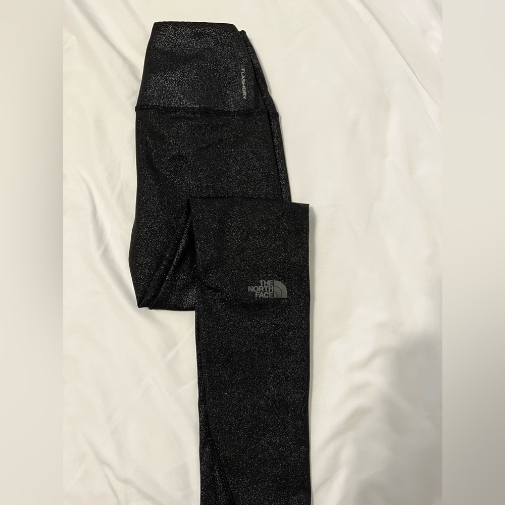 black sparkly north face leggings. size small. new w/o tags.